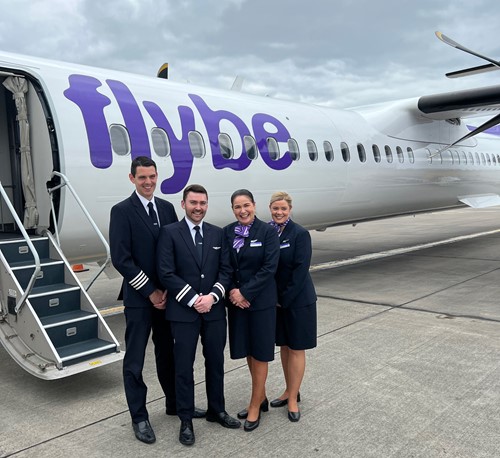 Flybe Crew standing outside aircraft