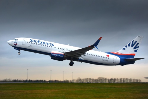 SunExpress aircraft taking off from Newcastle Airport